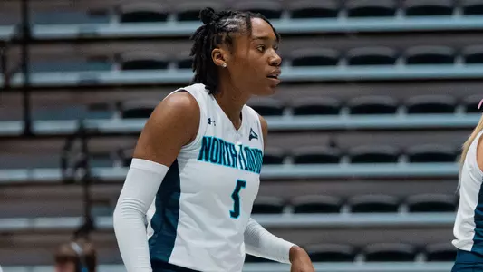 Mahalia White standing against FGCU