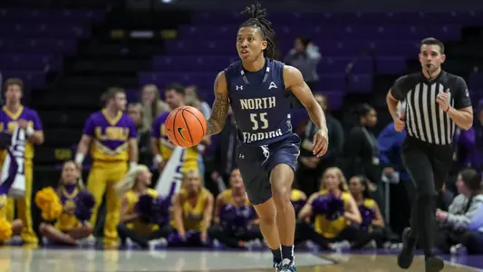 Ametri Moss driving up the court against LSU