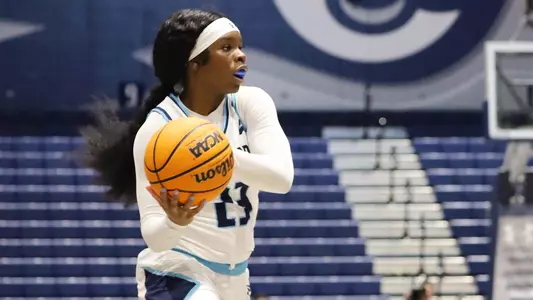 Kaila Rougier passing ball against Piedmont