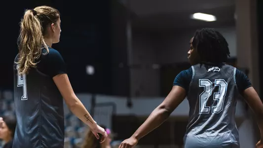 Sarah Taub and Kaila Rougier at practice before game