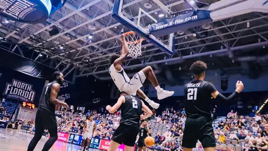 Dorian James with a dunk
