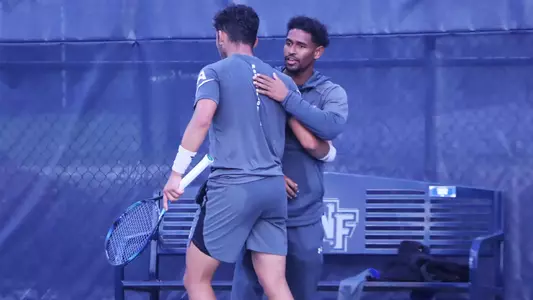 Breno Marques and Randy Phillips Celebrate Match Win