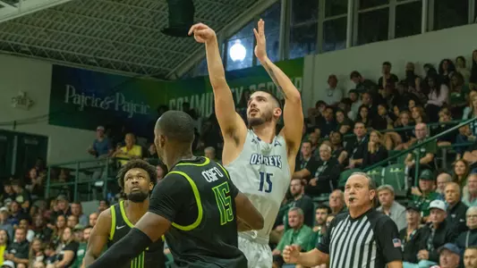 Jose Placer shooting a jump shot
