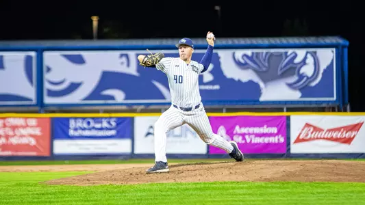 Peter Holden throwing a pitch to the plate