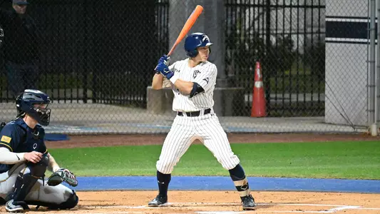 Aidan Sweatt standing at the dish