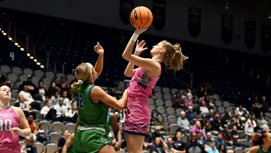 Sarah Taub with a floater against FGCU