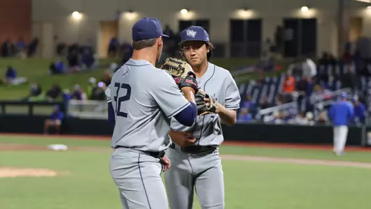Matthew Clements and Tony Roca high fiving