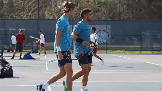 Rodrigo Crespo and Jonas Hartenstein walking together