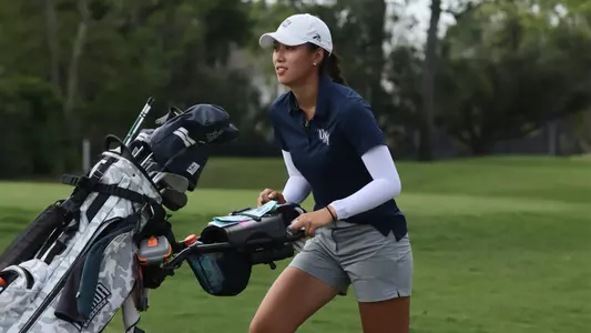 Jessie Cai walking up course at UNF Collegiate 2023