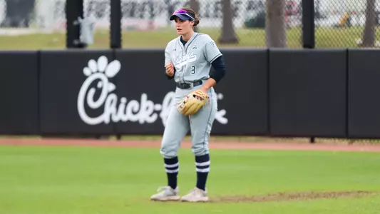 Chloe Culp standing in outfield