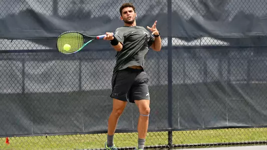 Rodrigo Crespo hitting a forehand against Bellarmine