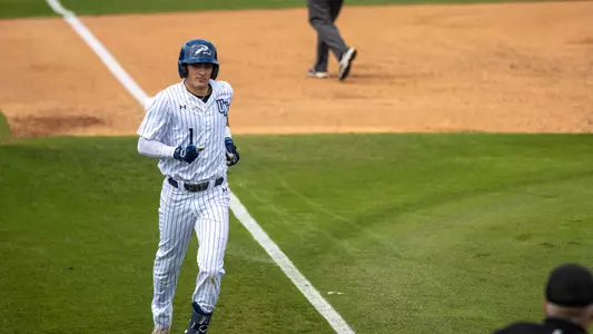 Alex Lodise rounding third base during the game against Queens