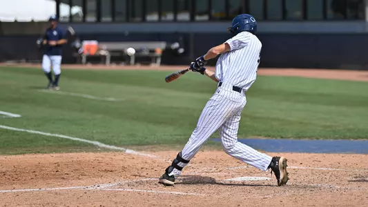 Cade Reich hitting a pitch