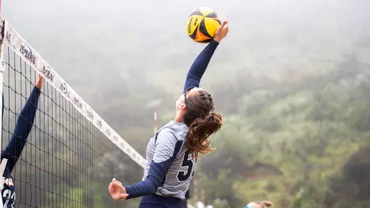 Presley Murray making an attack at the net