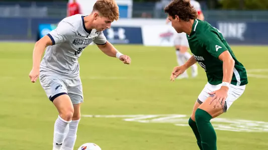 Braden Masker taking on defender