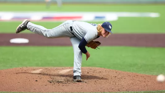 Clayton Boroski following through on a pitch