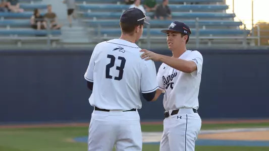 Will Ross shaking Cal Lenoard's hand
