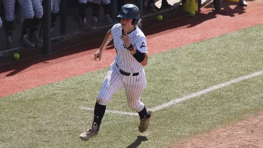 Mackenzie Woods running from third to home
