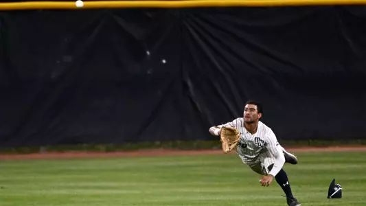 Austin Brinling diving to make a catch