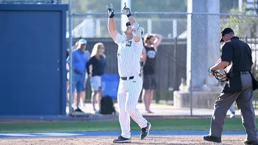 Jakob Runnels crossing home plate
