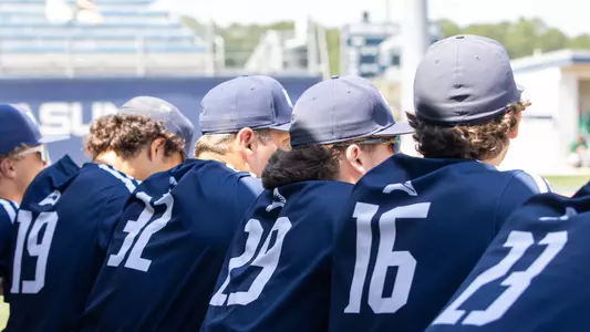 UNF baseball team in the dugout
