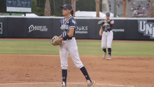 Izzy Kelly pitching against JU