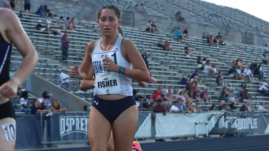 Erica Fisher competing at home track & field