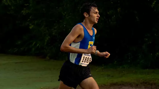Ryan Douihech runs cross country