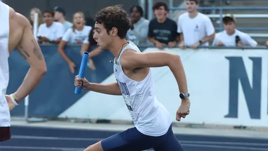 Ryan Douihech competing at home track & field relays