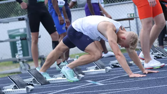 Ryan Thomas competing at home track & field