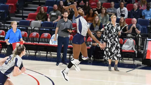 Mahalia White jumping to make an attack at Liberty
