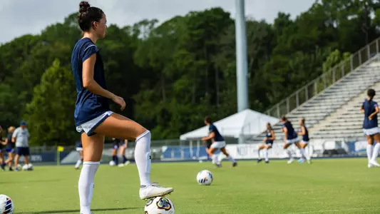 Averi Walraven standing on Hodges Stadium turf