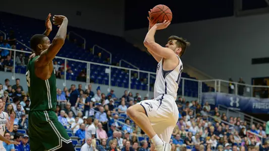 Ivan Gandia-Rosa going for a jump shot against JU