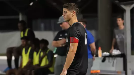 Bendi Burka on the pitch looking to sideline