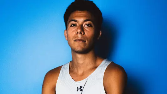 Robert Pedroza blue background shot