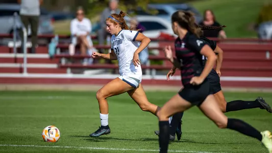 Brooklynn Fugel dribbling the ball forward