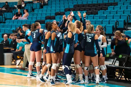 UNF volleyball team photo from the match against TCU