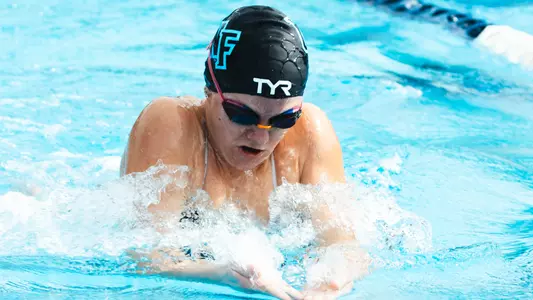 Bella Giresi competing at the UNF Competition Pool Complex