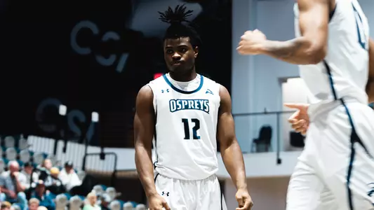 Jaylen Smith standing on the court
