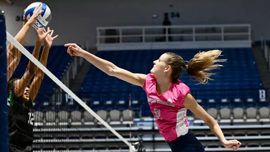 Amy Burkhardt going up for a kill
