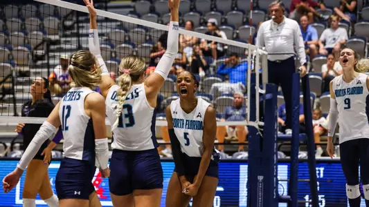 Jacqueline Arrington celebrates after a point