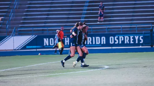Allie Fekany celebrating her goal against Jacksonville with her teammates