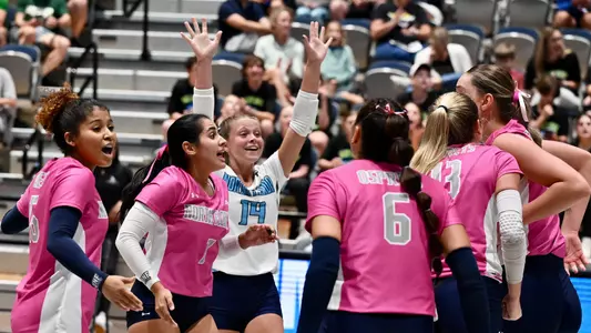 UNF volleyball team celebration