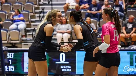 Annie Antar and Coepa huddle.