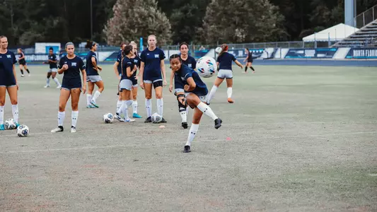 Kalliyan Pho shooting the ball in warmups at Hodges Stadium
