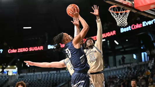 Jasai Miles goes for a jump shot