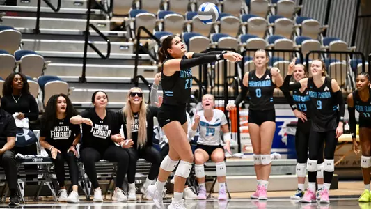 Kyla Solis going for a dig