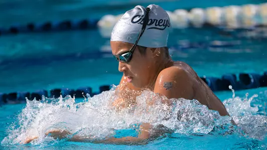 Victoria Torres swimming breaststroke at the UNF Competition Pool Complex