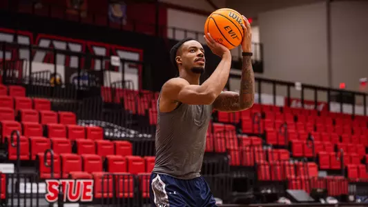 Jasai Miles going up for a jump shot