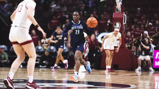 Kaila Rougier leading team downcourt